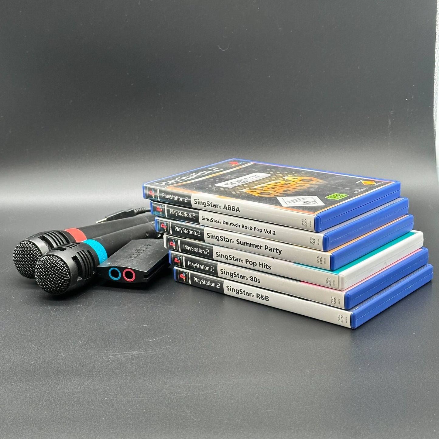 Singstar Silvester Party Paket für Playstation 2 inkl. Mikrofone - CDs wie neu ✅