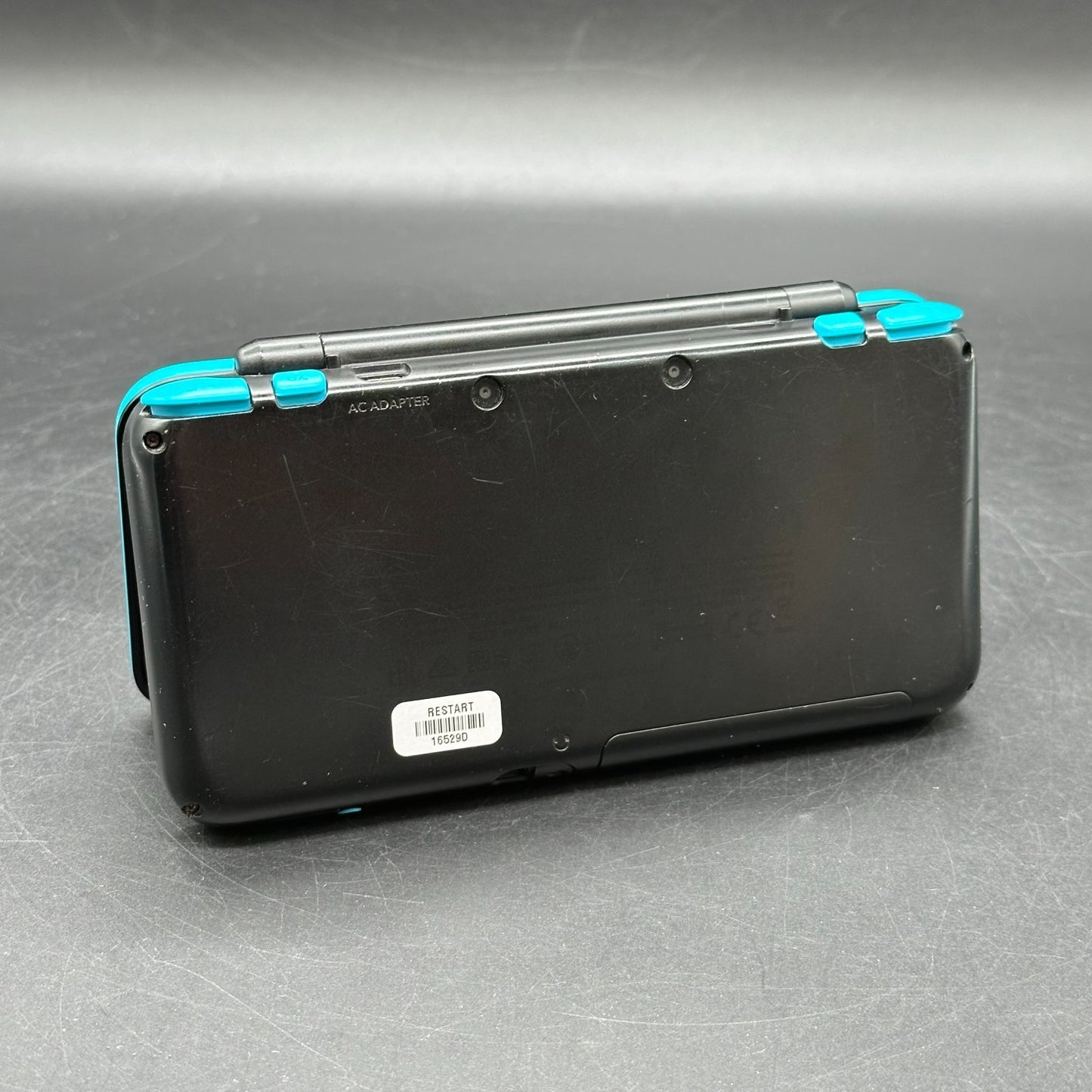New Nintendo 2DS XL Handheld-Spielekonsole - Schwarz/Türkis